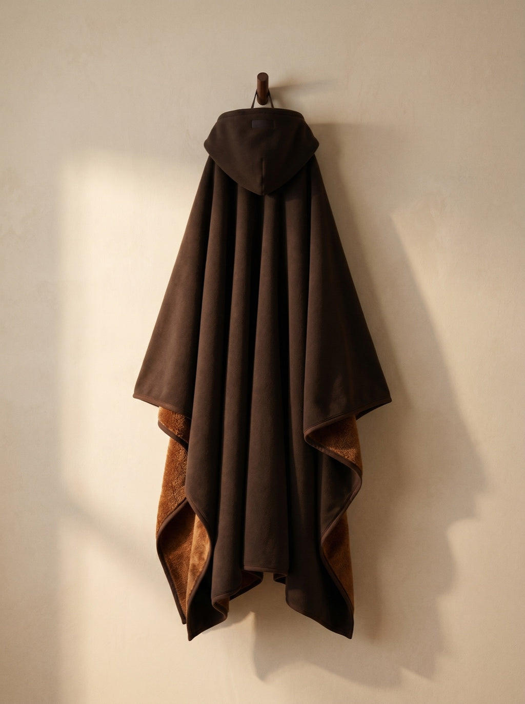 Terra — The Exhale, hung, corner folded back to show the deep-pile sherpa interior