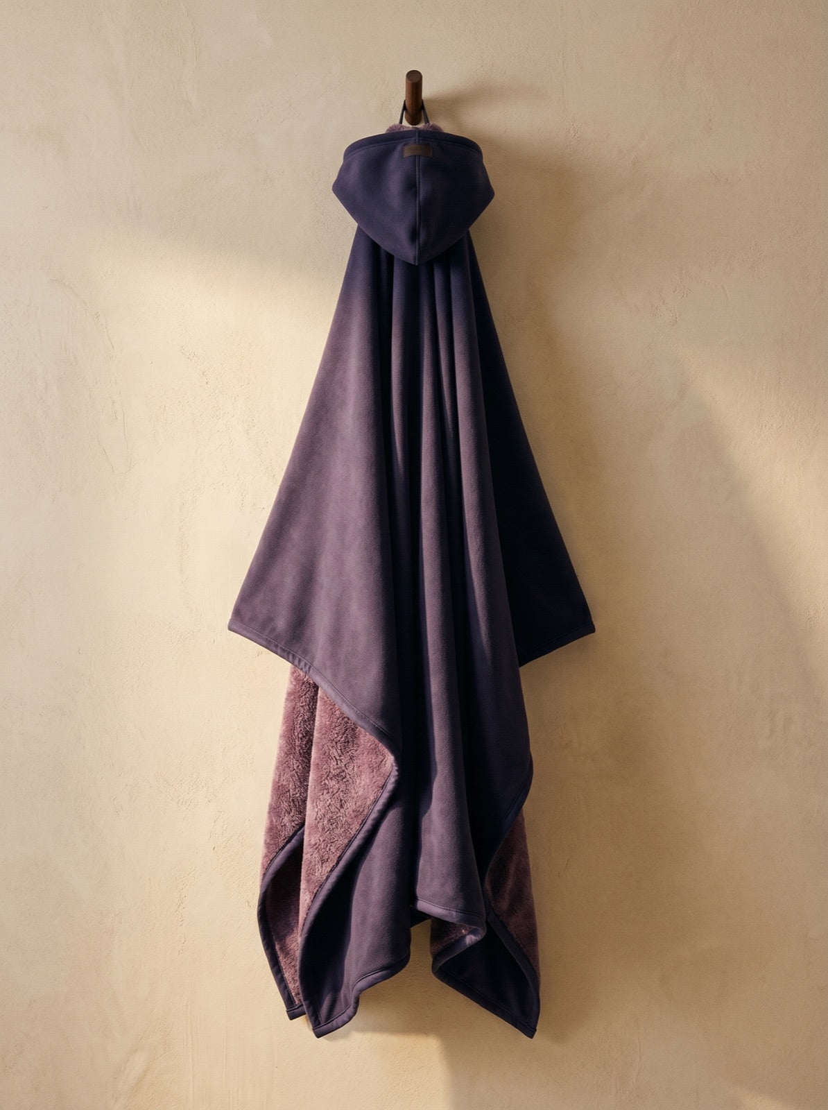 Enfold in Arcane, corner folded to show the faux fur interior