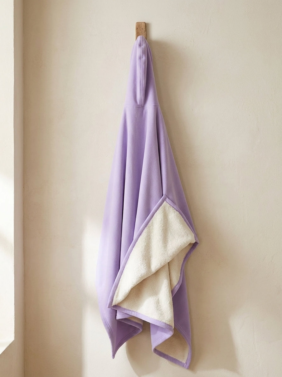Enfold in Haze, corner folded to show the faux fur interior