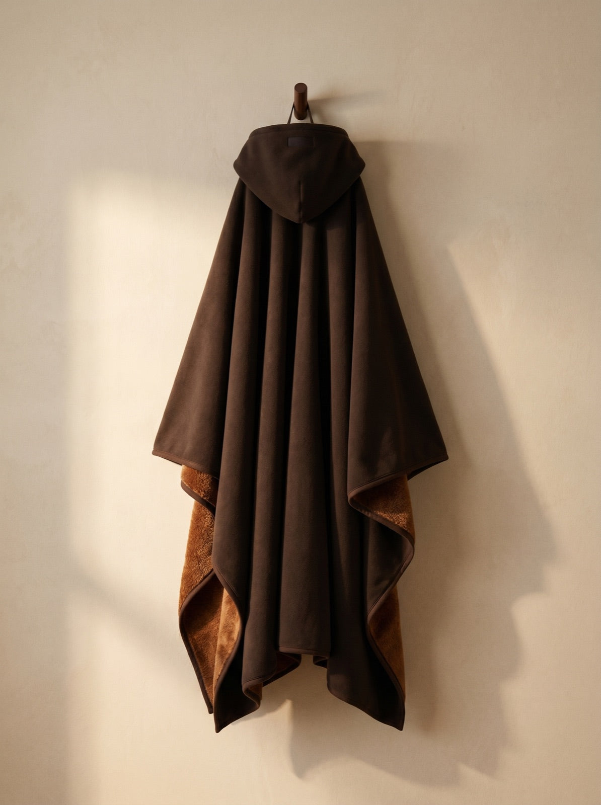 Enfold in Terra, corner folded to show the faux fur interior