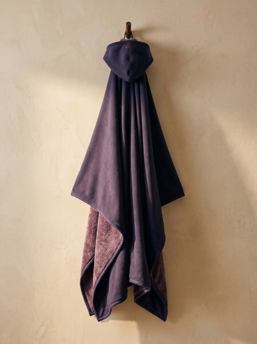 Enfold in Nightshade, corner folded to show the faux fur interior